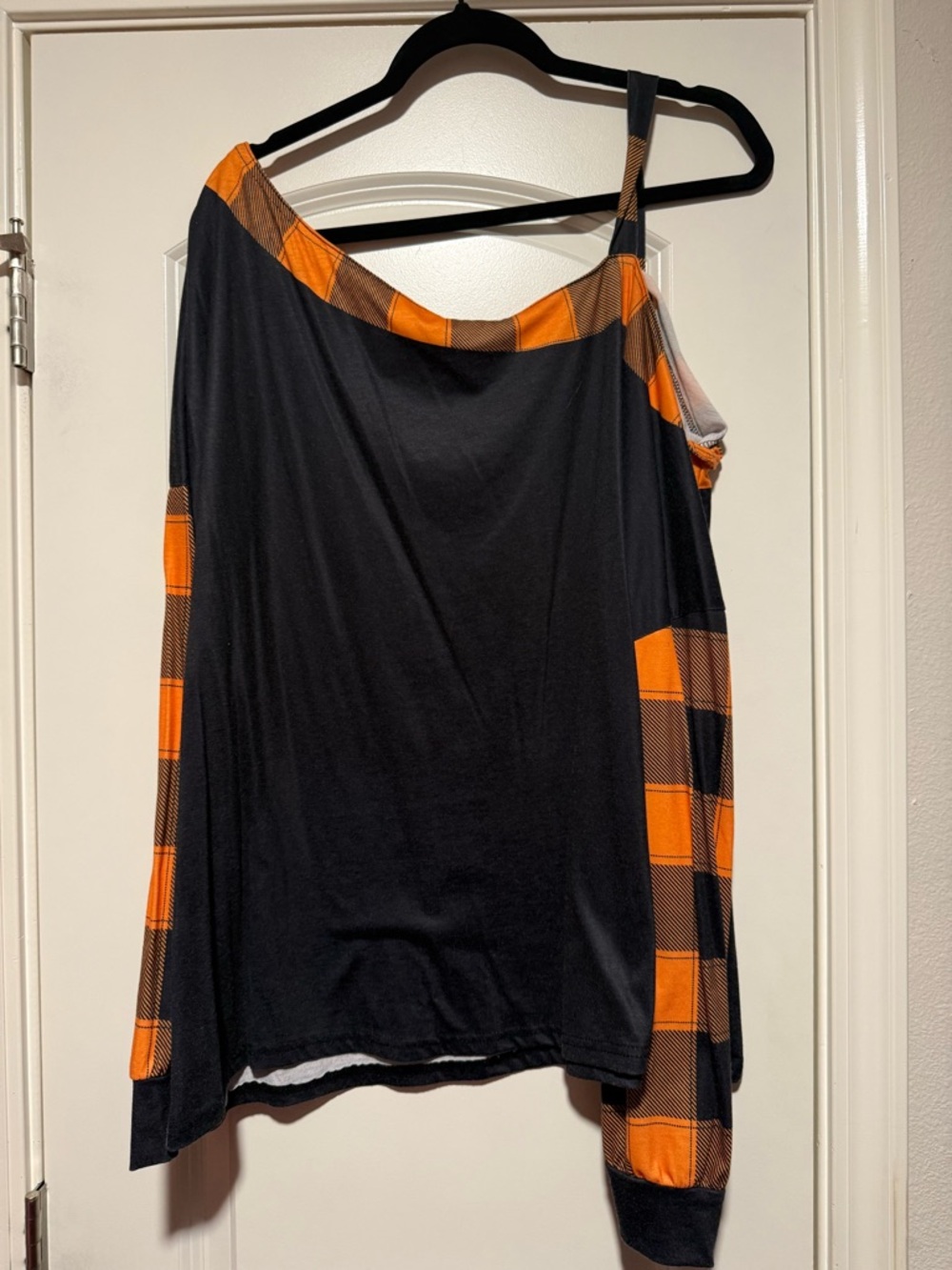 Black One-Shoulder Top with Orange Plaid Trim